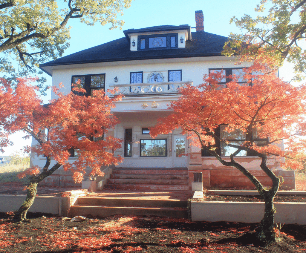 old home with beautiful trees